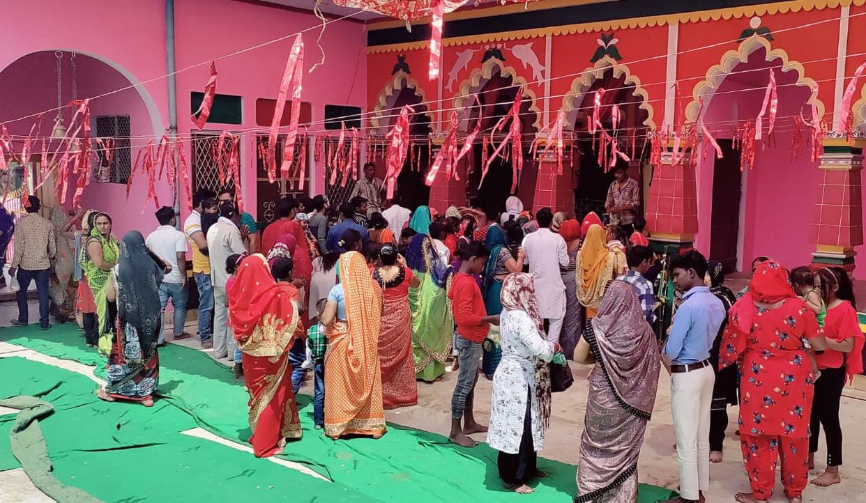 religion program,Devotees gathered in the temple
