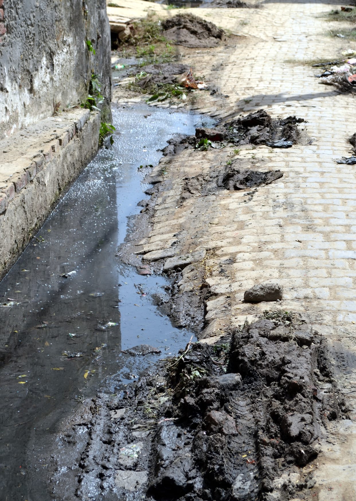 Dirt piled up, people got sick from house to house