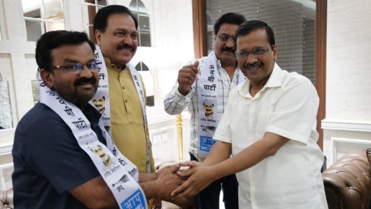Congress leaders from Gujarat Inderneel Rajguru and Vashrambhai Sagthiya join AAP in the presence of party convenor Arvind Kejriwal