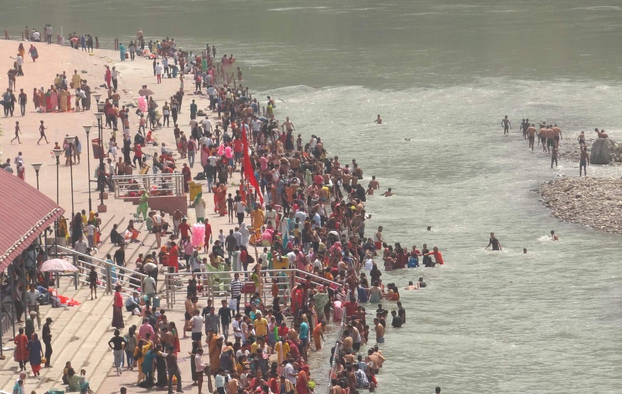 Bathing in the Ganges by offering Arghya to Suryadev