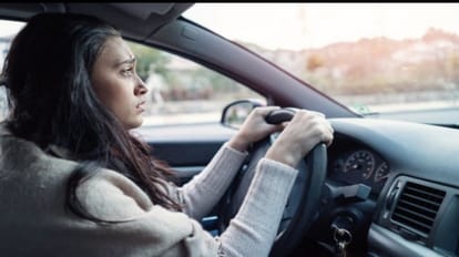 Gautam Budh Nagar traffic police challan woman for driving car without wearing helmet