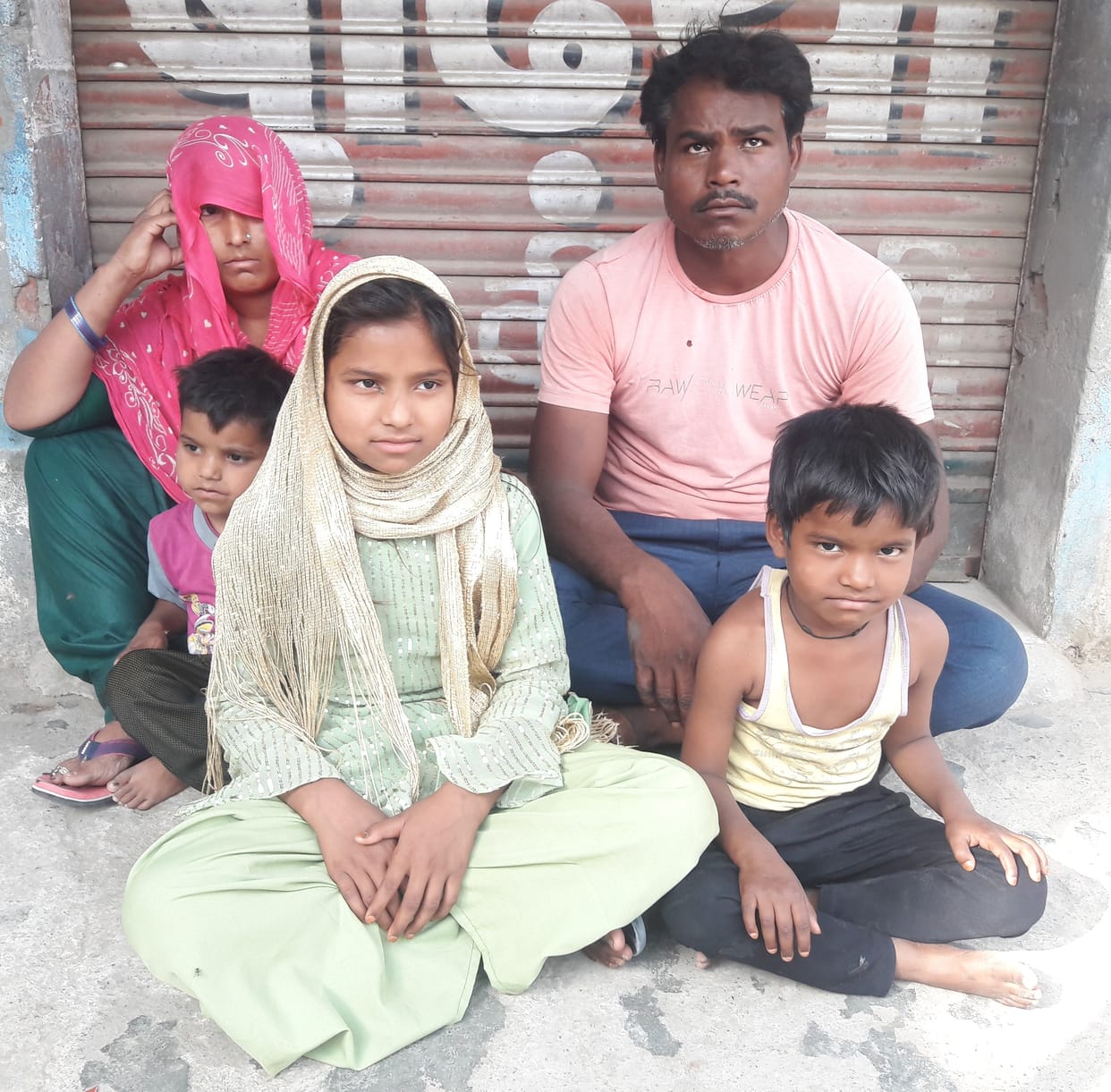 Family sitting on dharna accusing brother of cheating