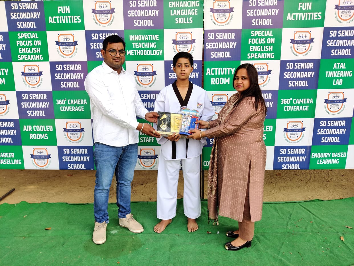 Silver medalist student Chaitanya honored
