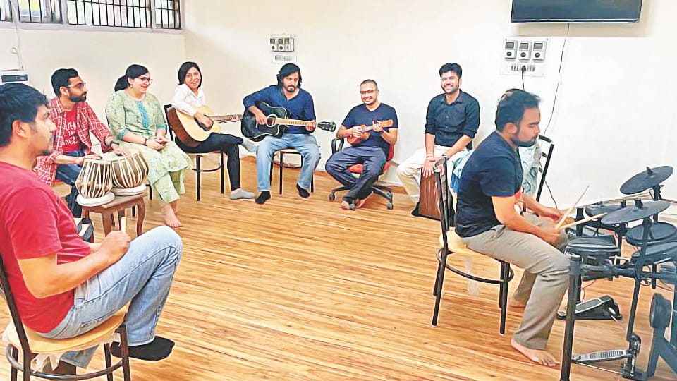 Resident doctors of Chandigarh PGI relieving their stress with help of music and yoga