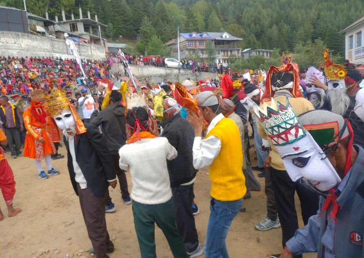 Devotees gathered to see the masks of God