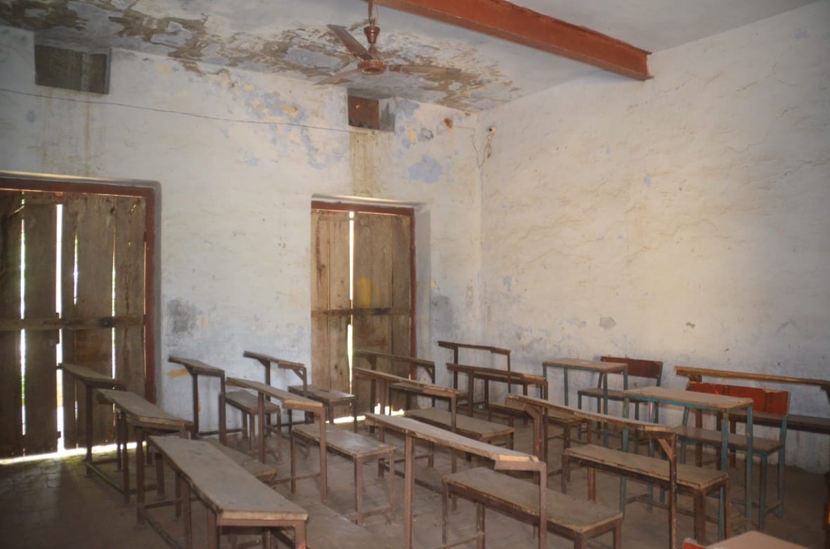 Teachers will check the copies in a dilapidated building