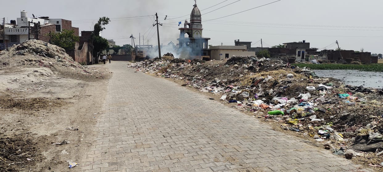 Administrator absent from villages, piles of dirt in the streets