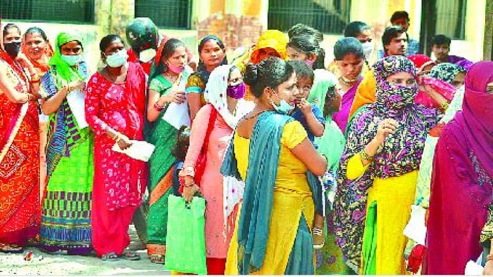 condition of two female patients standing in the sun deteriorated in Lady Loyal OPD agra
