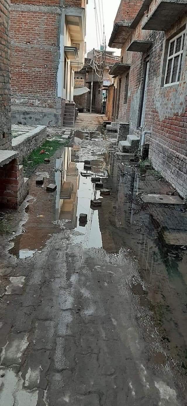 Drain closed due to culvert construction, water filled in the street