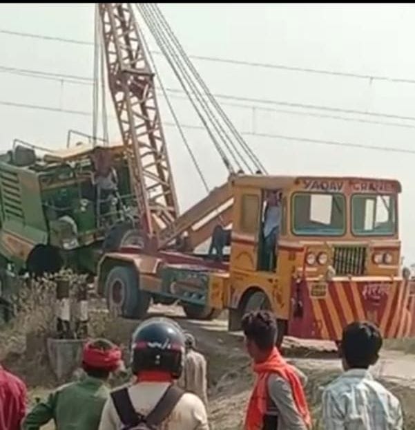 Combine stuck at railway crossing near Padra Sikanderpur village