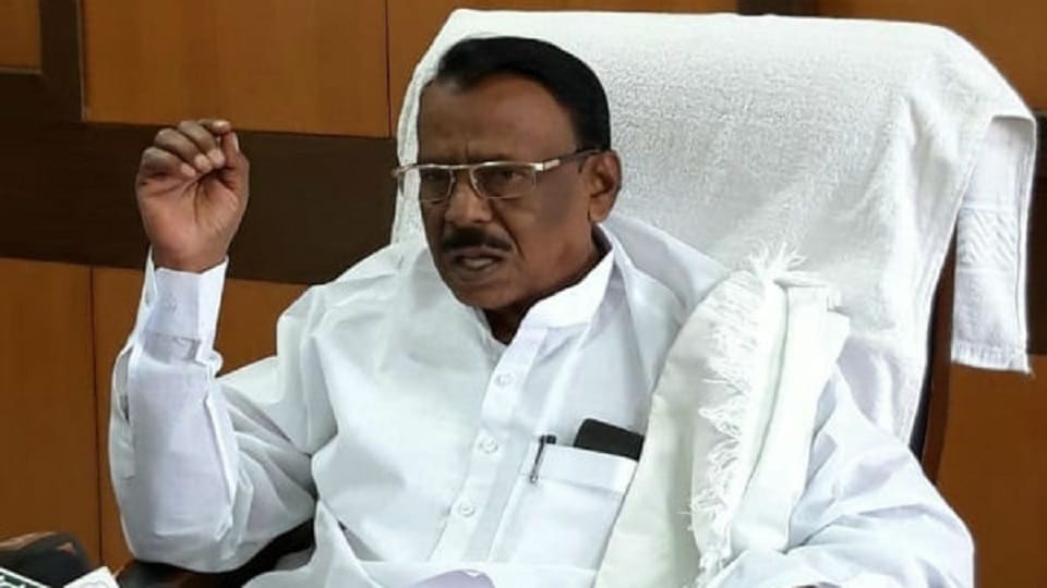 Pavagada Congress MLA Venkataramanappa slapped a youth  for  Saying him with a request for basic necessities for his village