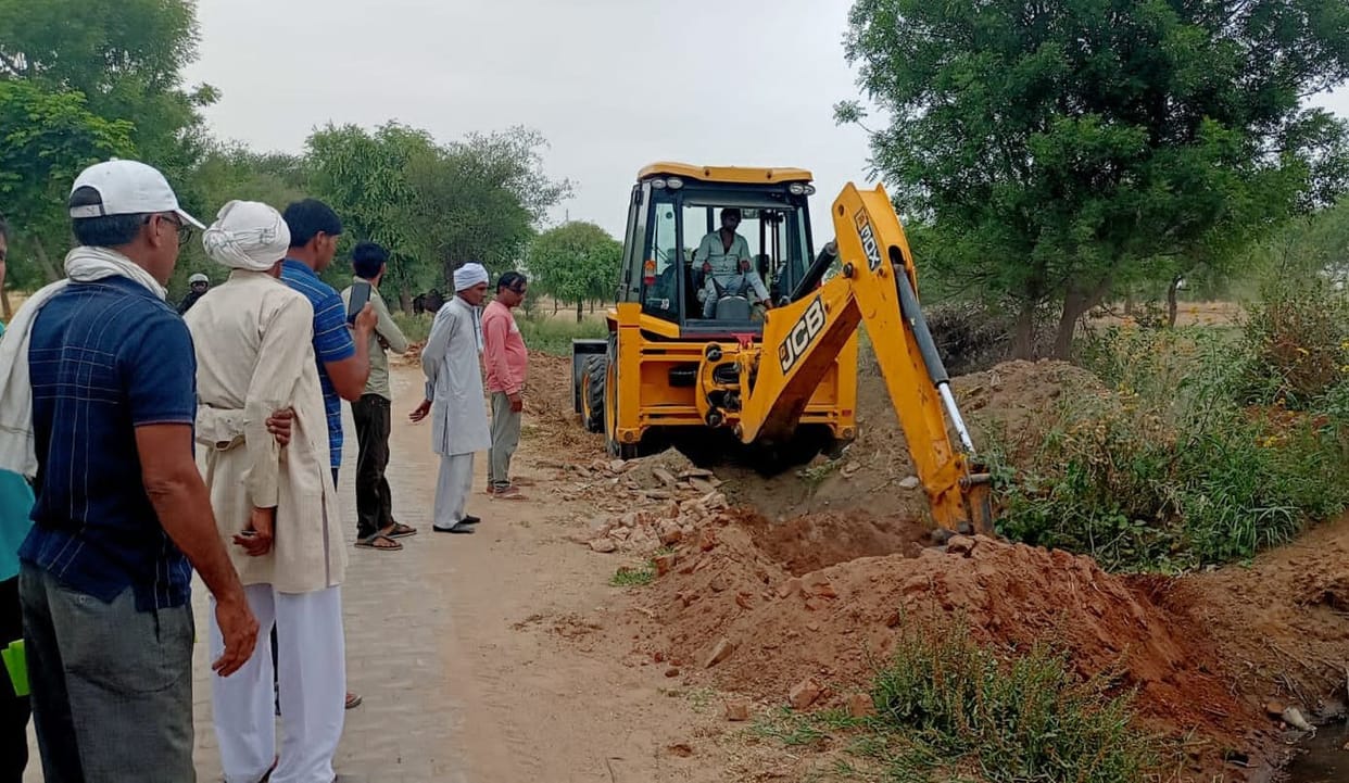 BDPO excavated drain from JCB with police force