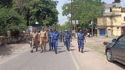 Rapid Action Force personnel flag march with Varanasi police collect intelligence report with geographical location