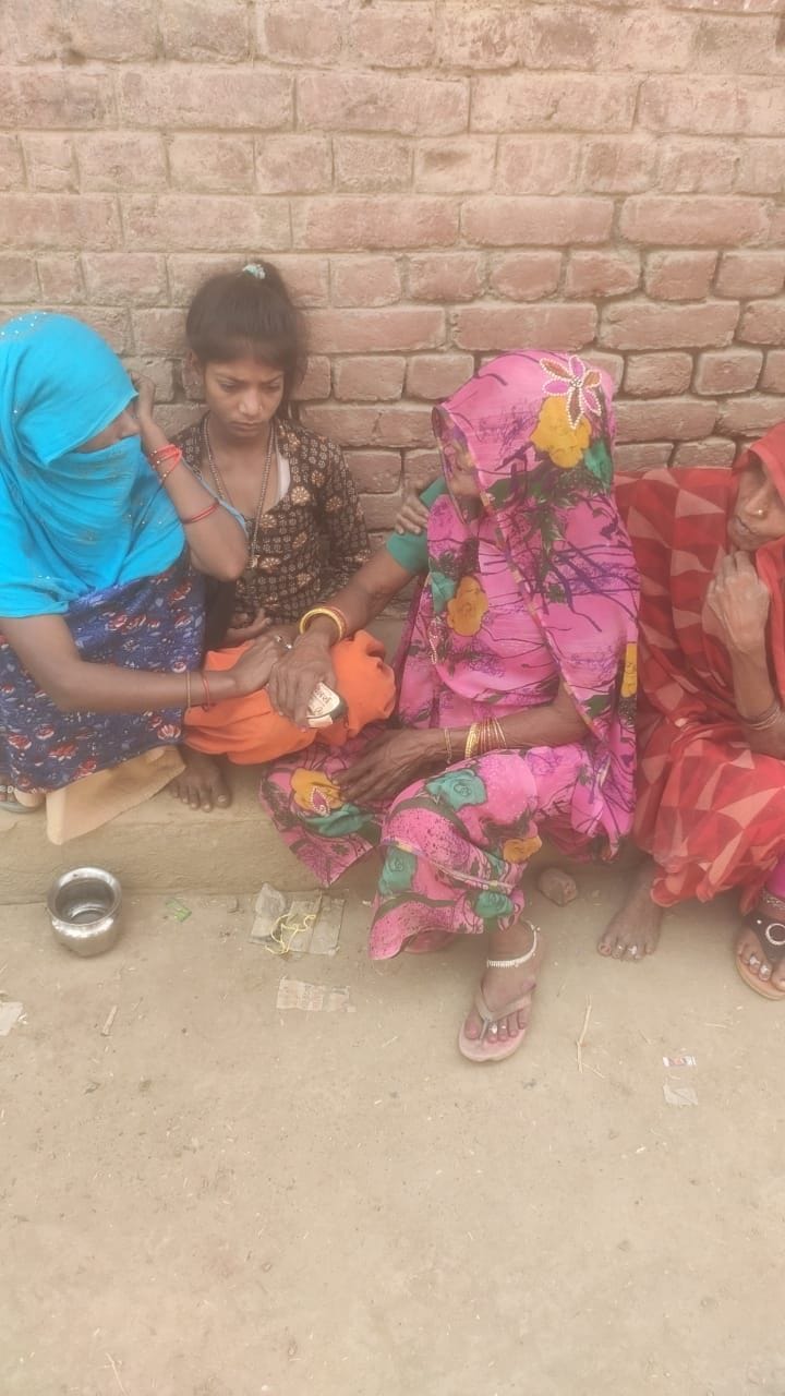 Woman murdered by stabbing her throat with rope