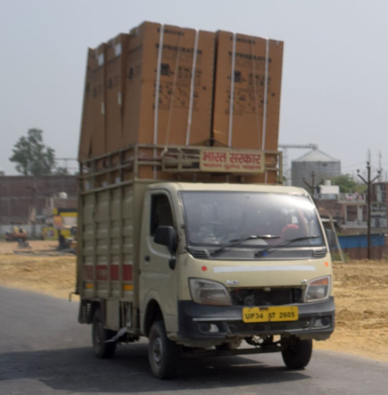 six km. overloaded truck staggered nine times in