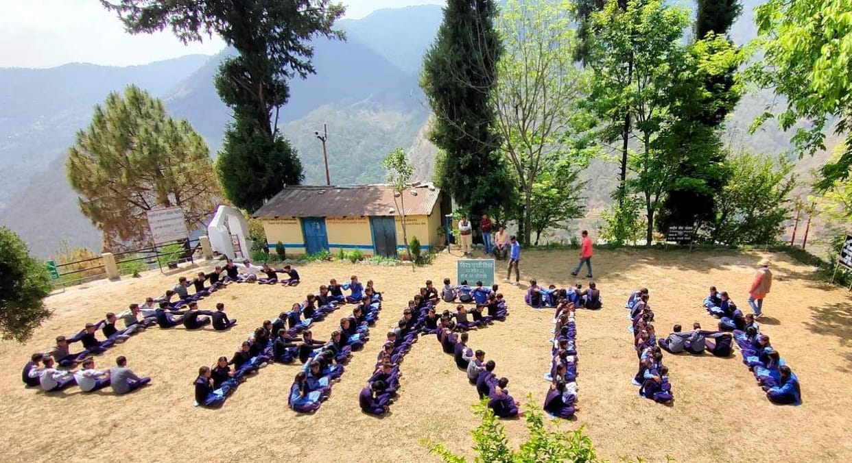 Students planted saplings on Earth Day