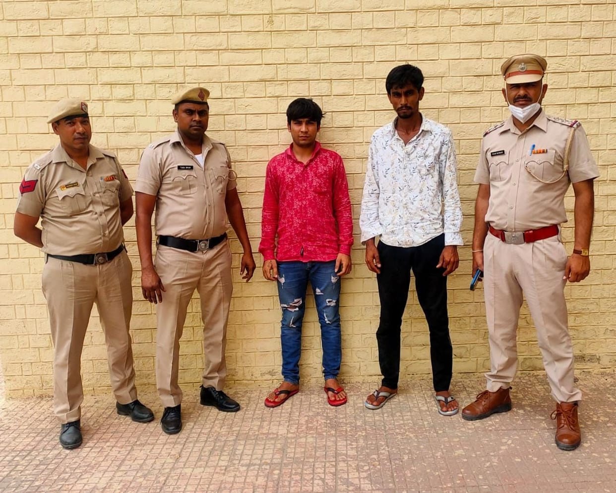 Two people arrested for killing man
