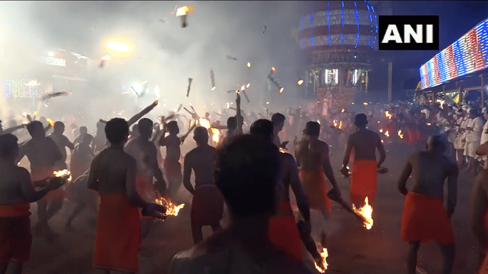 Agni Kheli: Devotees hurled fire at each other, unique tradition is 'Thoothedhara'  in Sri Durgaparameshwari temple in Kateel, Karnataka