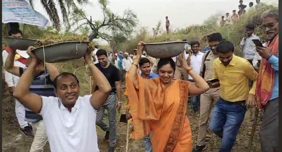 MLA and DM used shovels, carried soil