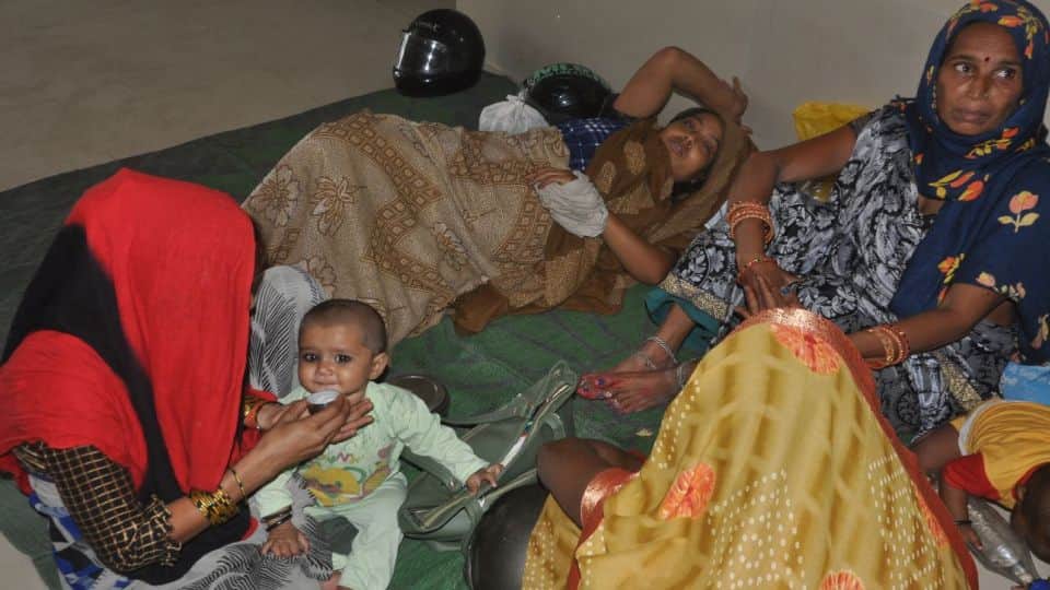 condition of two female patients standing in the sun deteriorated in Lady Loyal OPD agra