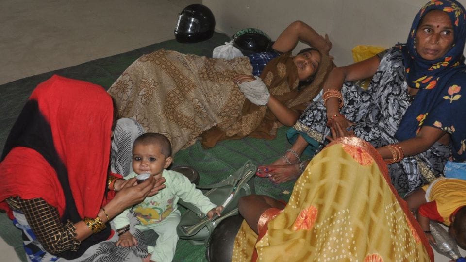condition of two female patients standing in the sun deteriorated in Lady Loyal OPD agra