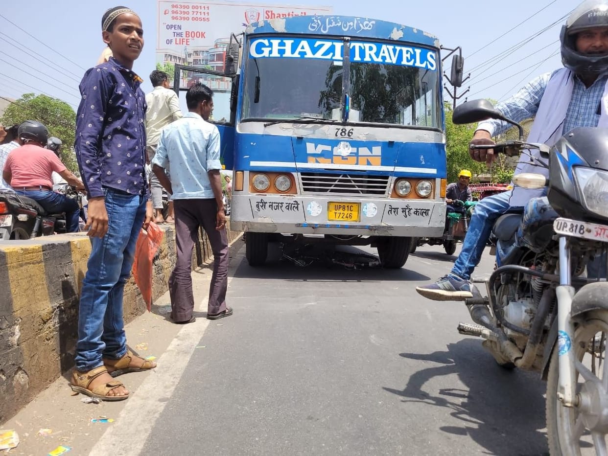 Two children riding bicycles survived being hit by a bus