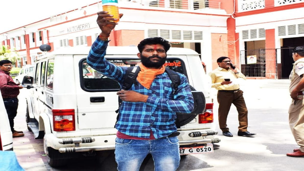 Youth reached collectorate to commit self-immolation with petrol upset over land grab and non-action on attackers