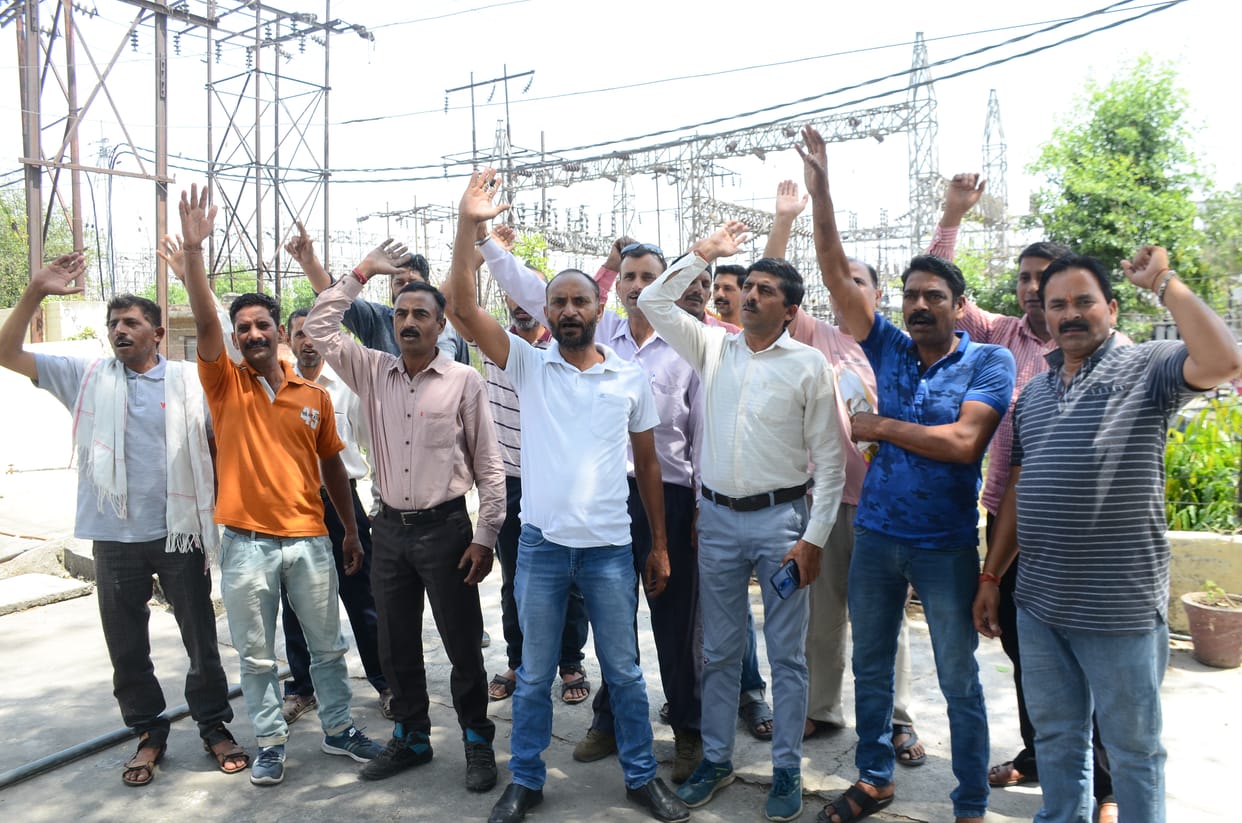Electricity workers expressed anger over the demand for regularization