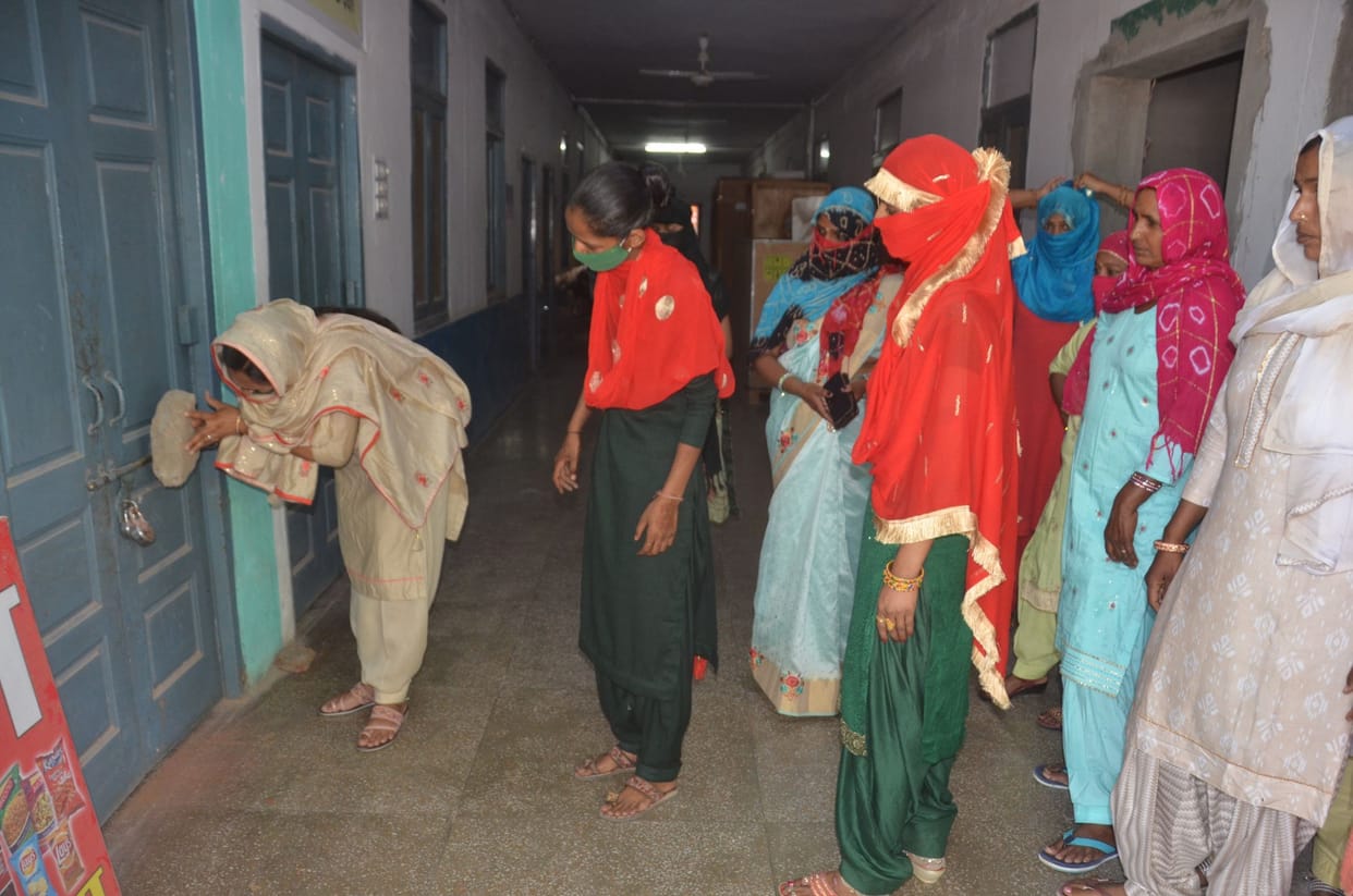 Self help group women created ruckus in front of my kitchen