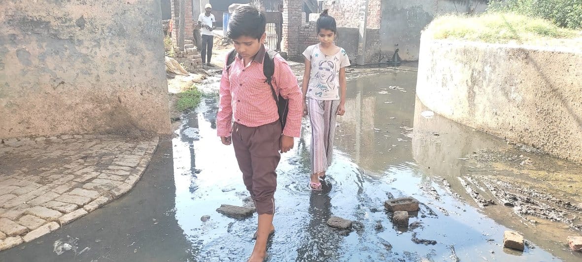 overflowed pond, water filled on the road