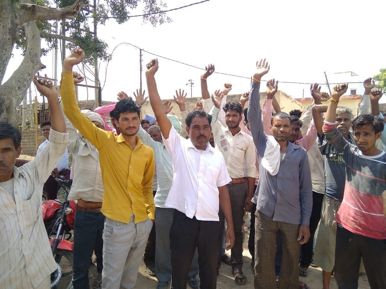Villagers gherao the power substation in Sahaswan, shouting slogans