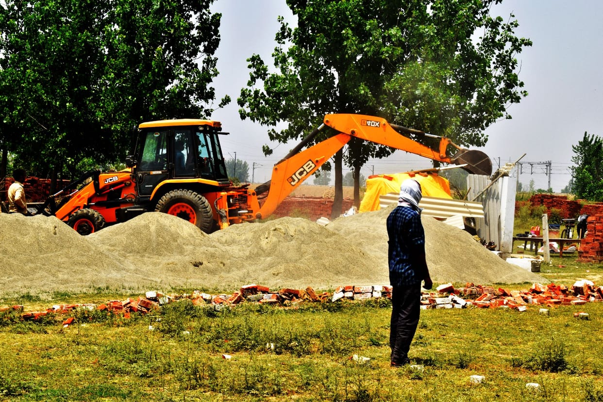 Bulldozer run on illegal construction in Subhashnagar