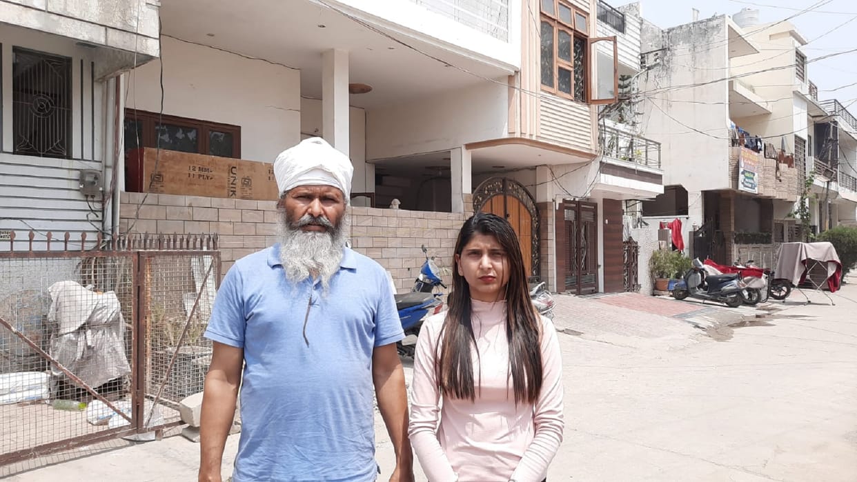Woman sitting on dharna outside husband s house