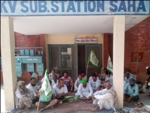 Farmers troubled by power cuts staged a sit-in at the power house