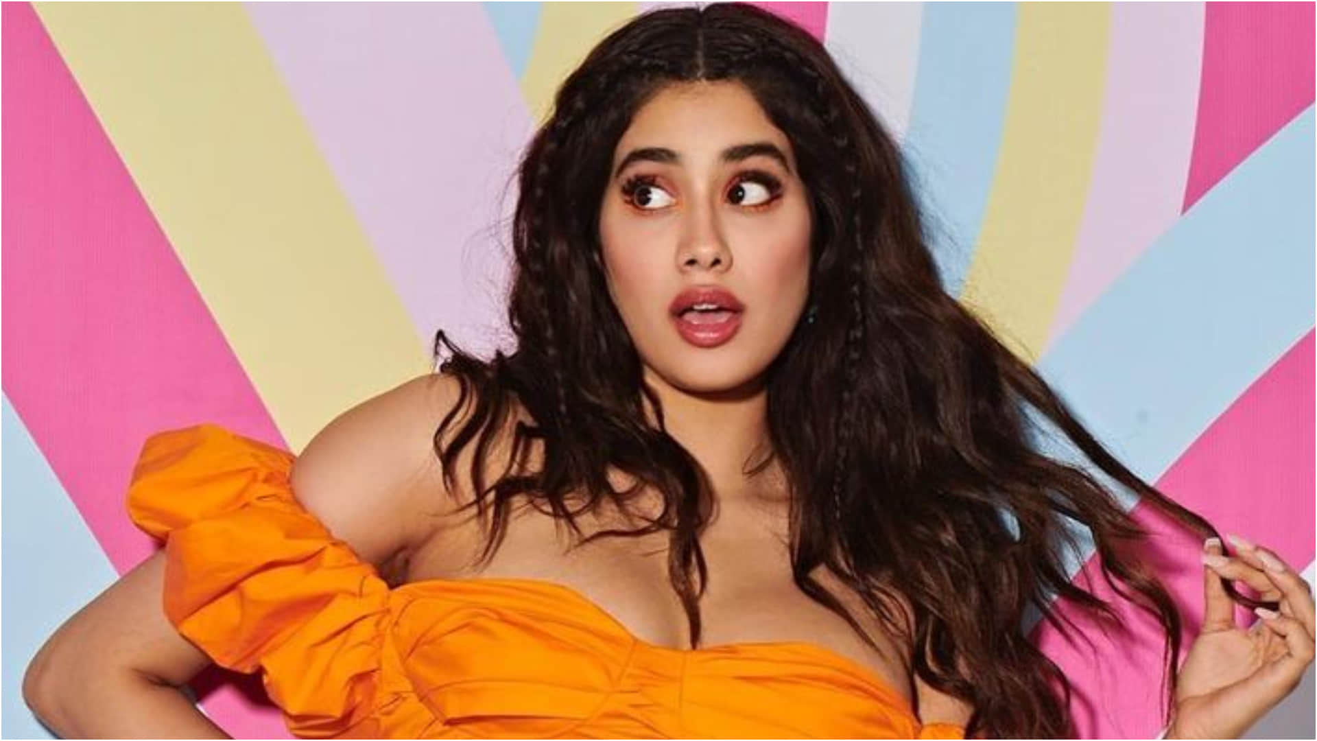janhvi kapoor looks beautiful in ruched orange mini bodycon dress show her curvy figure