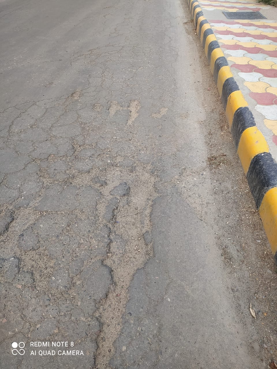 Patchwork done on the road uprooted in two months