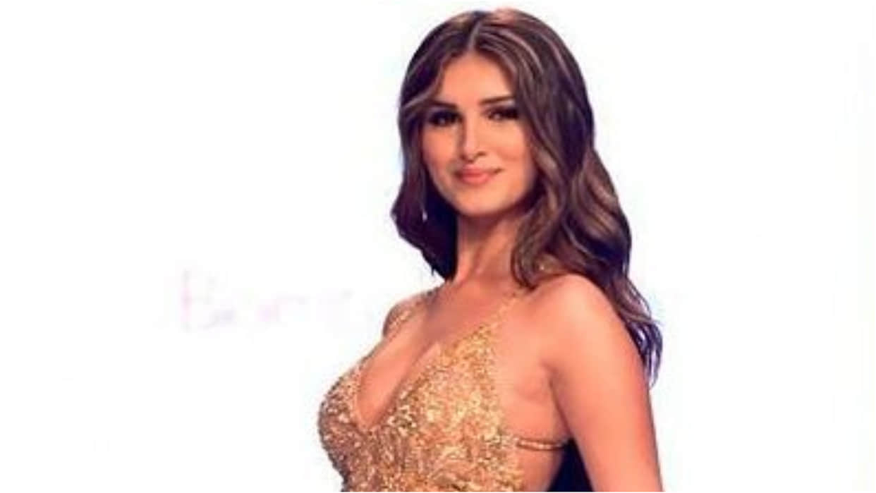tara sutaria steal the show on ramp walk in golden thigh high slit gown with bold look