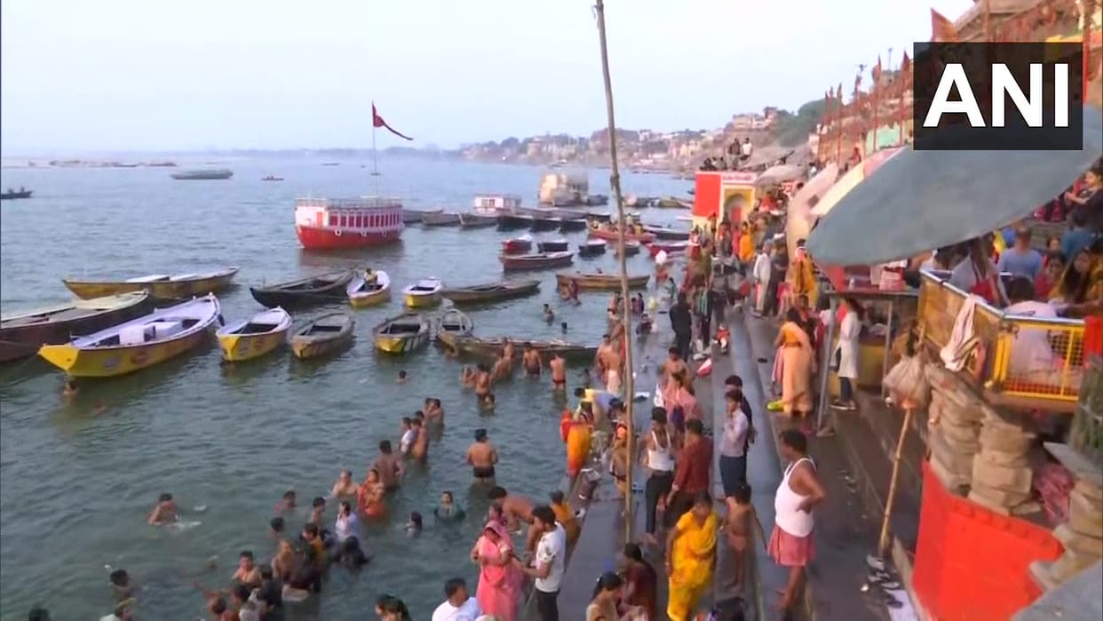 Varanasi Devotees take a dip in the Ganges on the occasion of Akshaya Tritiya