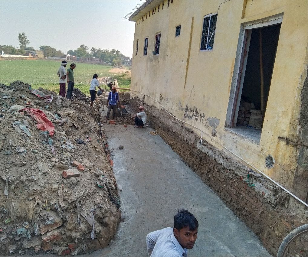 Construction of drain in Peergab pond without metering