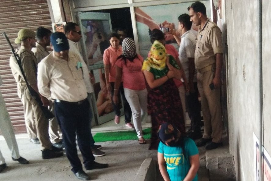 Massage center raided, five girls and nine youths arrested
