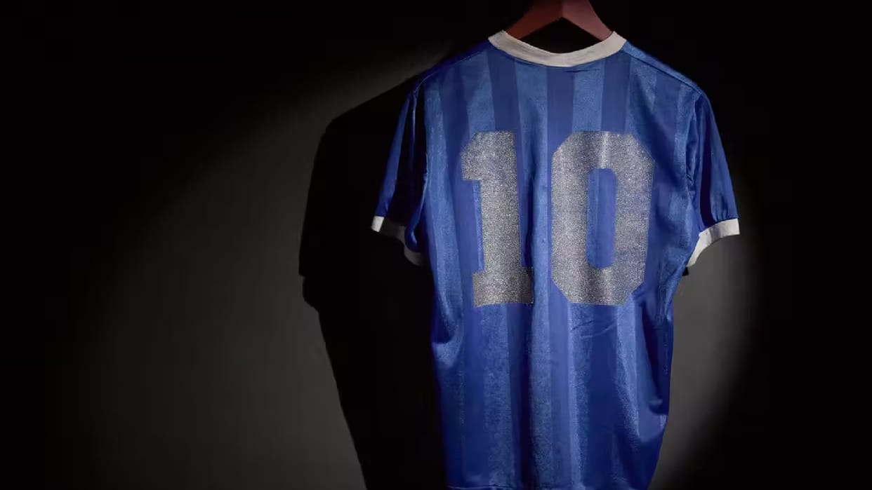 Maradona's Hand of God' football shirt sets auction record in UK