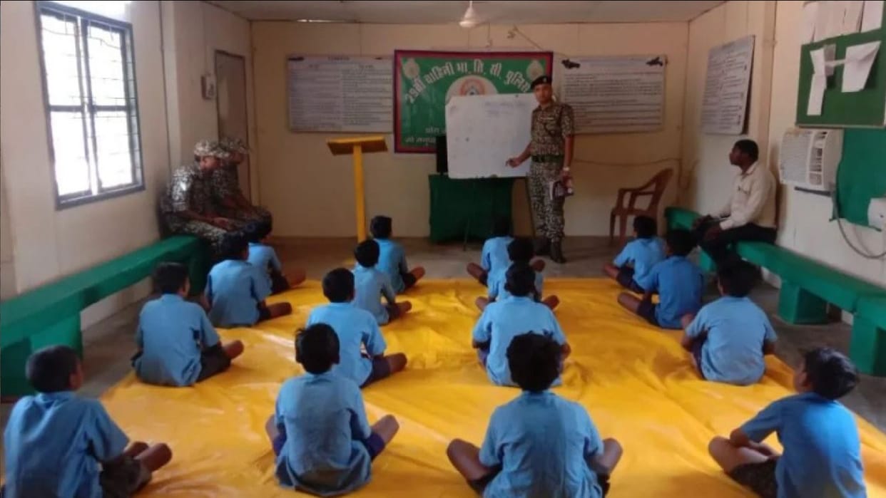ITBP personnel coaching classes for rural children in Naxal affected areas of Chhattisgarh