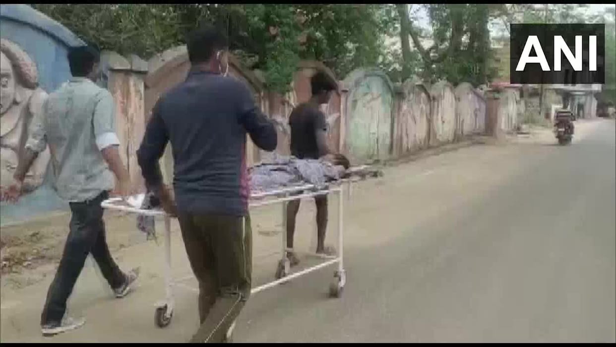 Kin of patient taking him on a stretcher to doctor's residence upon his absence in a district hospital in Koriya