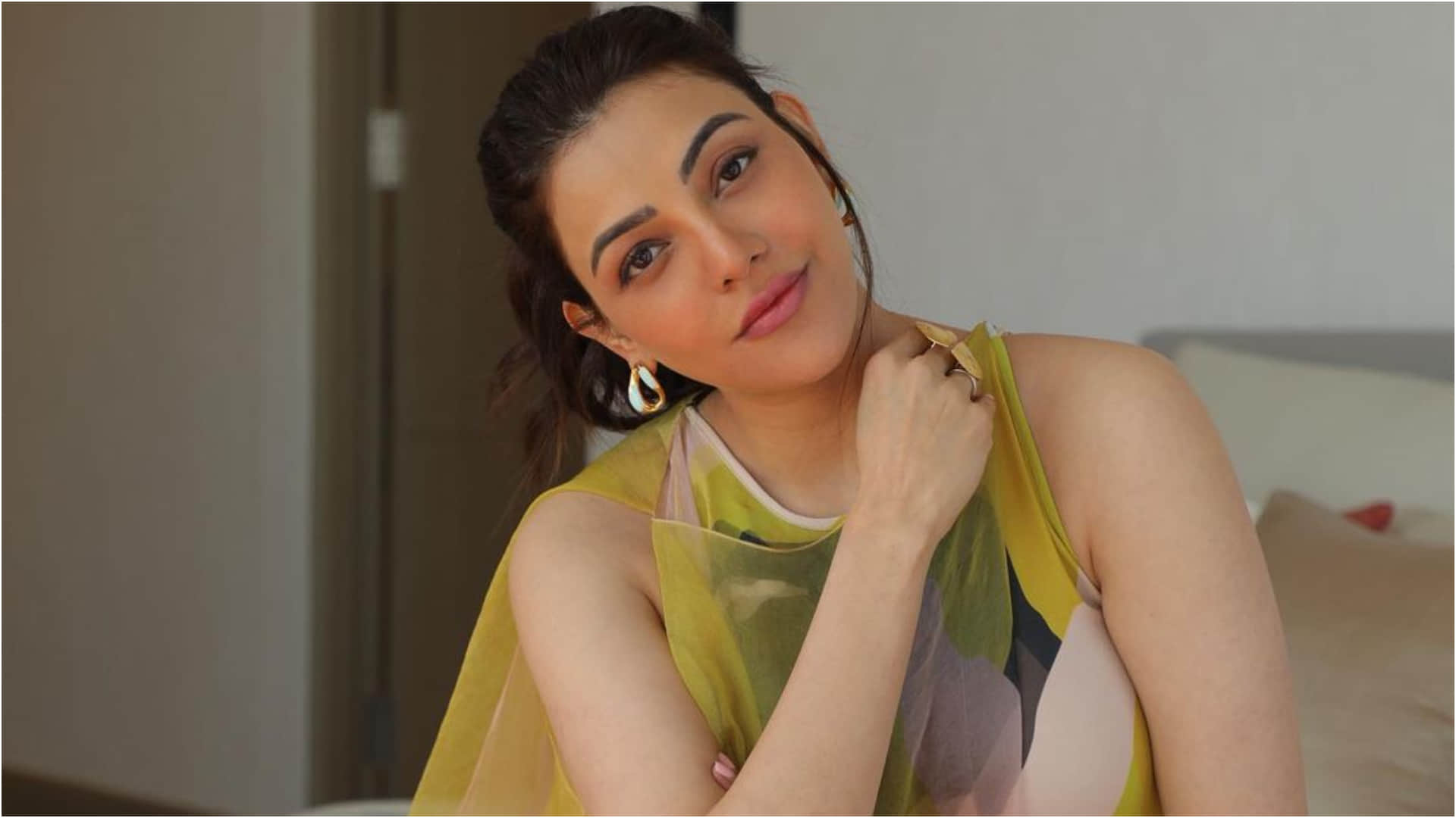 new mom kajal aggarwal shares summer ready stylish pic in thigh high slit gown