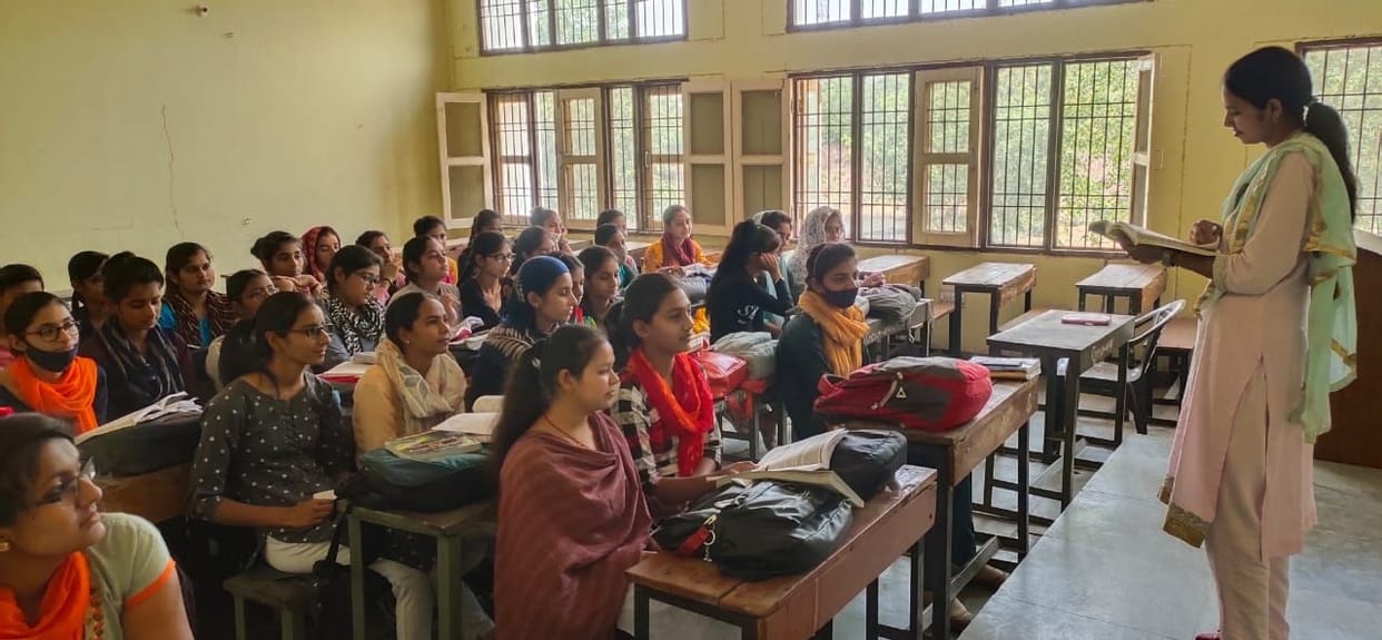 Poonam playing the role of a clerk in the office and a teacher in the class