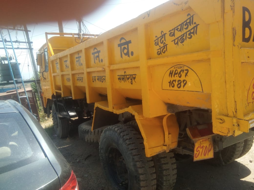 PWD tipper parked idle, materials are being carried by paying rent in private vehicles