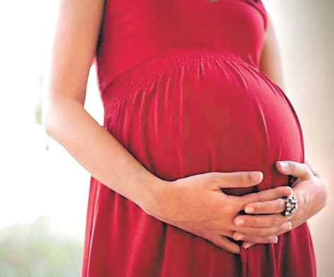 Pregnant women sweating in the sun for free ultrasound