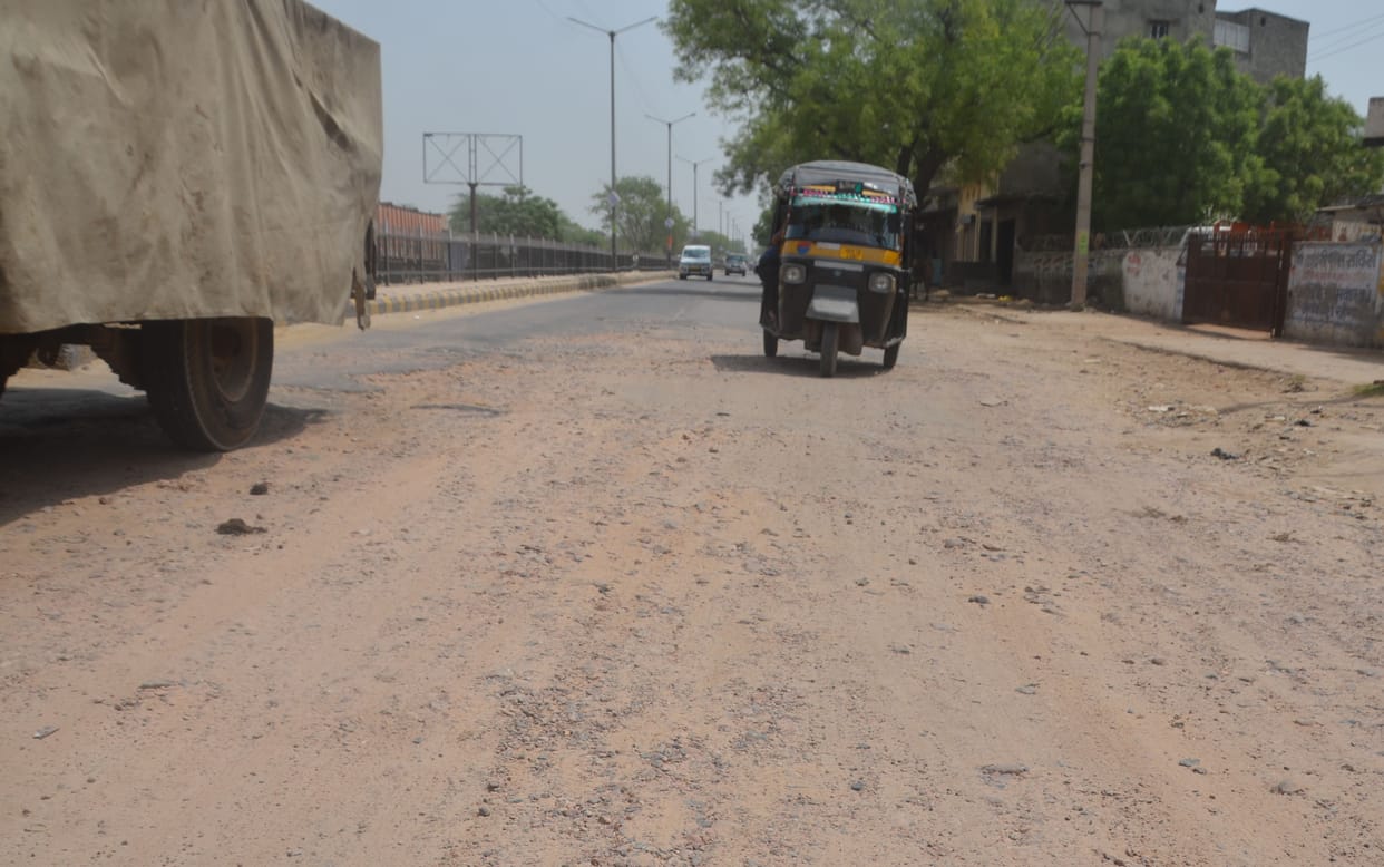 Plan: To build a model stretch road, Reality: One foot deep potholes on the road