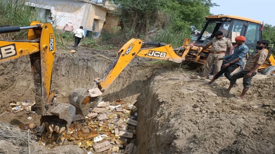 Illegal liquor destroyed by bulldozer in etah
