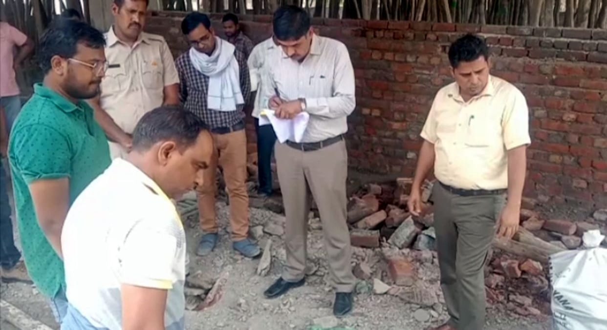 XEN team samples for construction material from under construction building